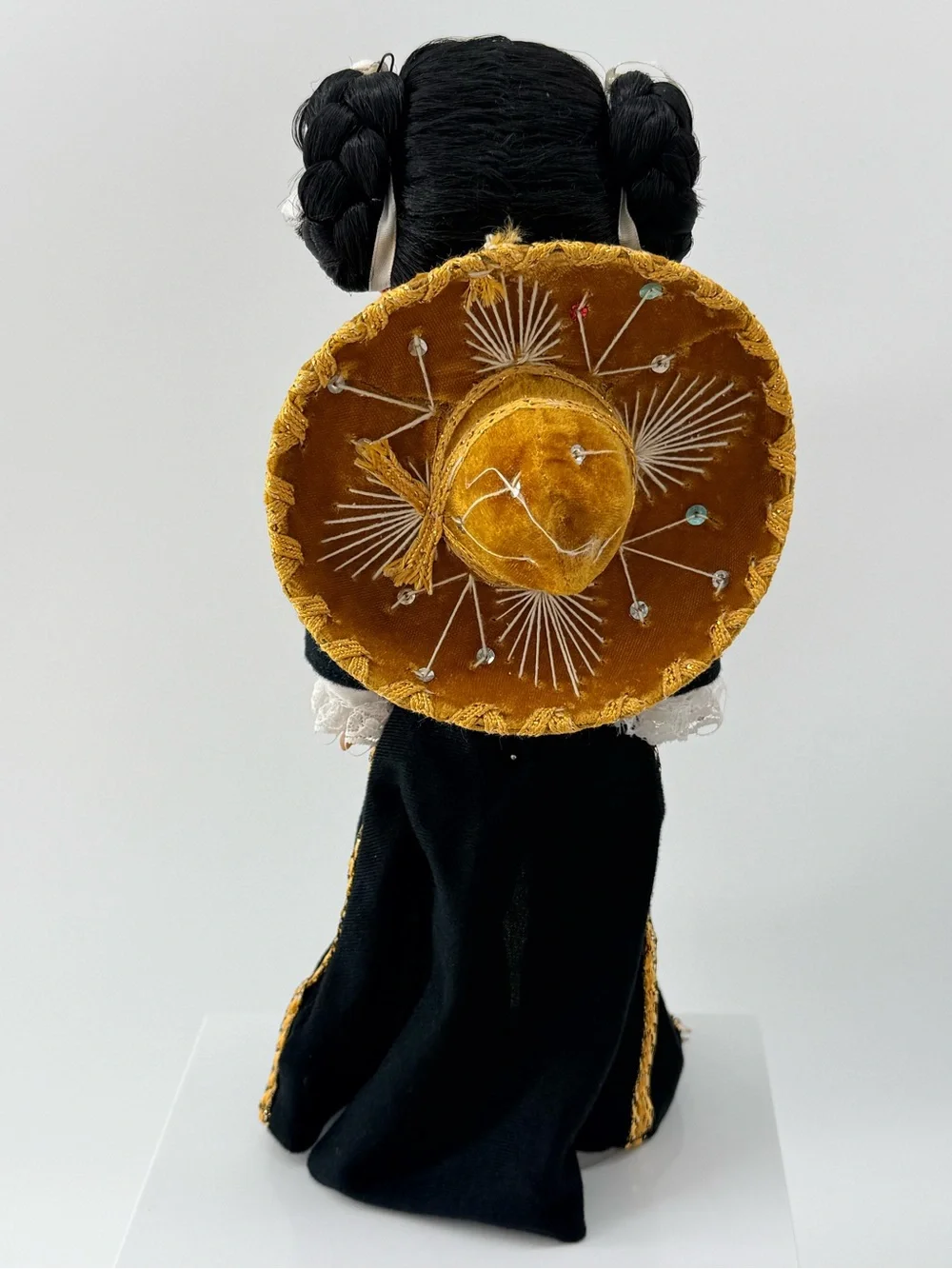 Traditional Black Cloth Doll with Yellow Sash and Lace Accents